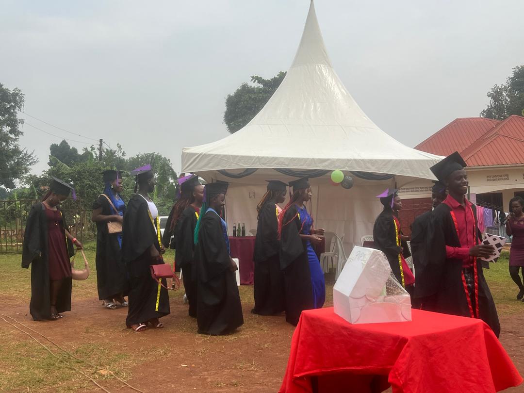 Vocational graduates walking past the ceremony tent